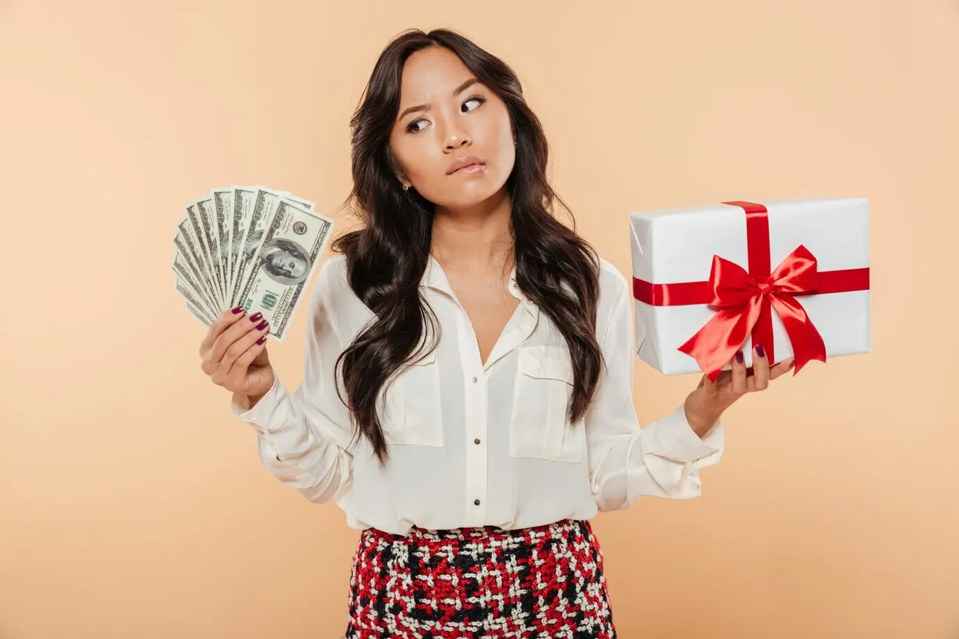 A portrait depicting an Asian woman looking confused.